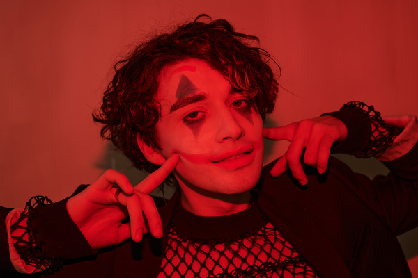 Man with Joker Makeup for Halloween